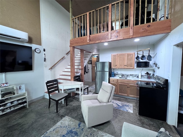 235 Hcr 2128, Whitney, TX 76692 - living area featuring a wall unit AC, stairs, and concrete flooring