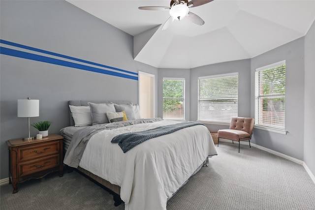 carpeted bedroom with baseboards and a ceiling fan