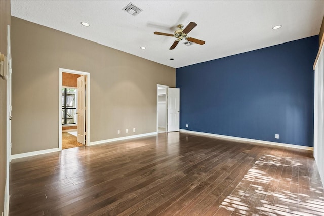 unfurnished room with a ceiling fan, hardwood / wood-style flooring, baseboards, and recessed lighting