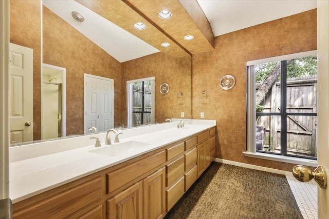 full bath with lofted ceiling, baseboards, double vanity, recessed lighting, and a shower with door