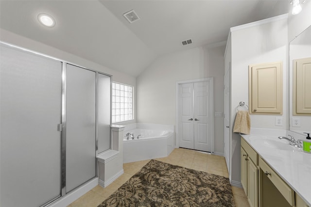473 Inverness Dr, Fairview, TX 75069 - full bathroom with vanity, tile patterned floors, vaulted ceiling, a shower stall, and a garden tub