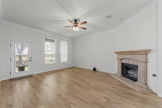473 Inverness Dr, Fairview, TX 75069 - unfurnished living room with light wood finished floors, ceiling fan, ornamental molding, a premium fireplace, and baseboards