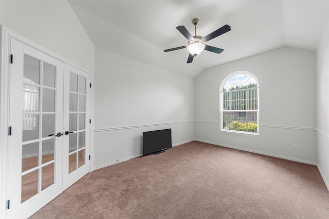 473 Inverness Dr, Fairview, TX 75069 - carpeted empty room featuring french doors, vaulted ceiling, a ceiling fan, and baseboards