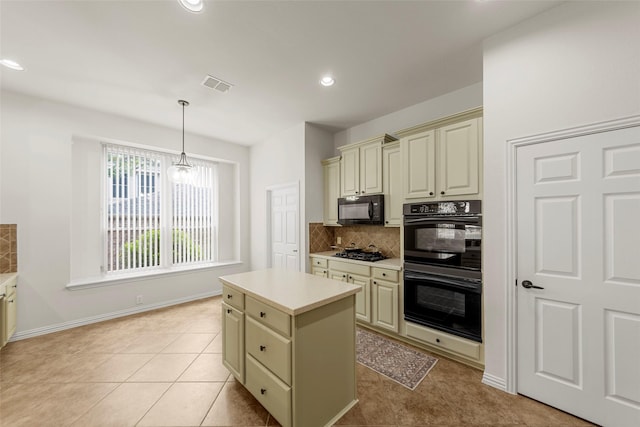 473 Inverness Dr, Fairview, TX 75069 - kitchen featuring cream cabinets, black appliances, backsplash, light countertops, and pendant lighting