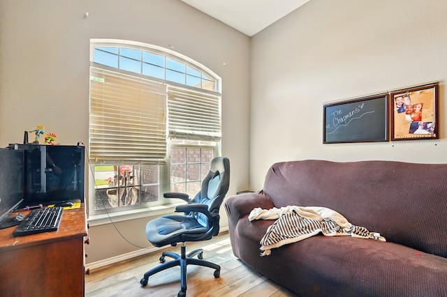 office featuring wood finished floors and baseboards