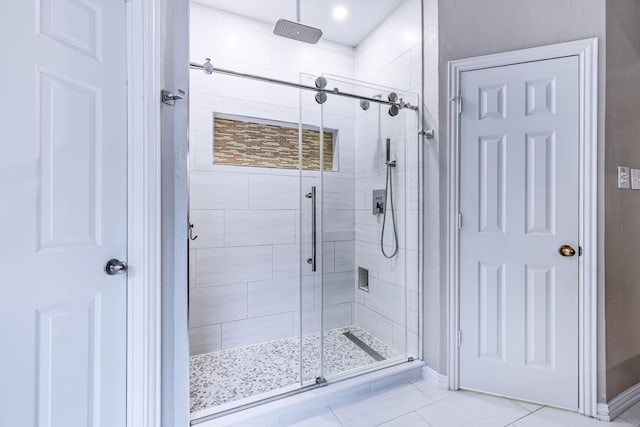 1430 Westmont Dr, Allen, TX 75013 - bathroom with a shower stall, tile patterned flooring, and baseboards
