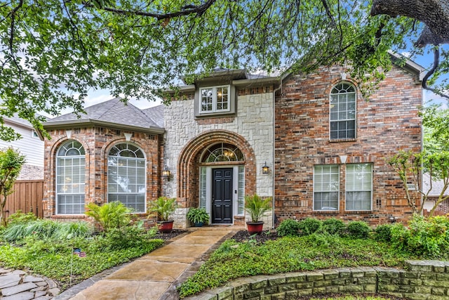 1430 Westmont Dr, Allen, TX 75013 - view of front facade featuring brick siding and fence