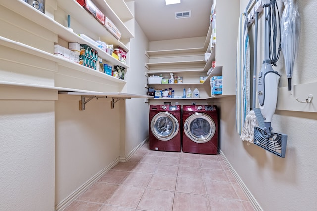 1430 Westmont Dr, Allen, TX 75013 - washroom with washing machine and clothes dryer, tile patterned flooring, and baseboards