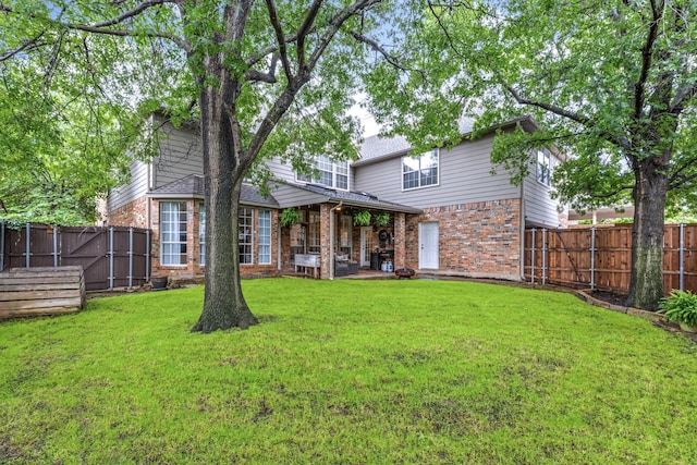 1430 Westmont Dr, Allen, TX 75013 - rear view of property featuring brick siding and a patio