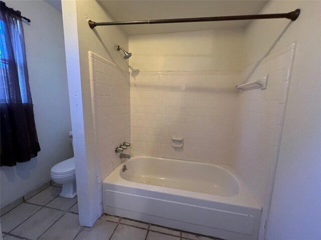 216 E Homewood Dr, Crockett, TX 75835 - bathroom featuring tile patterned flooring, toilet, and shower / tub combination