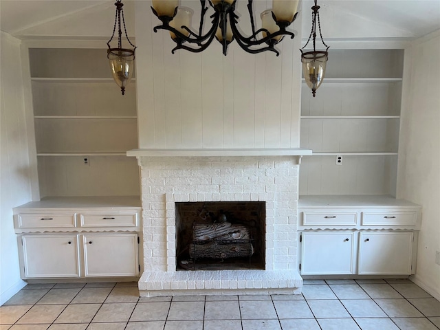 216 E Homewood Dr, Crockett, TX 75835 - unfurnished living room with light tile patterned floors, a fireplace, and built in shelves