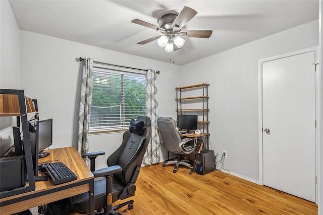 6405 Longmont Trl, Fort Worth, TX 76179 - office area with a ceiling fan, wood finished floors, and baseboards