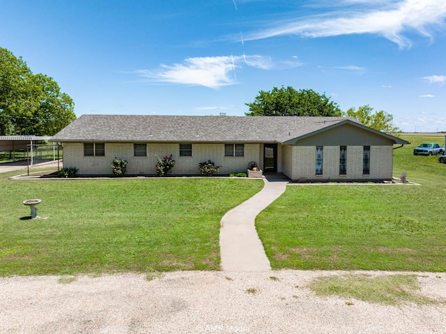 1201 New Hope Rd, Stamford, TX 79553 - ranch-style house featuring brick siding and a front yard