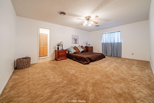 1201 New Hope Rd, Stamford, TX 79553 - bedroom with carpet, a textured ceiling, and ceiling fan