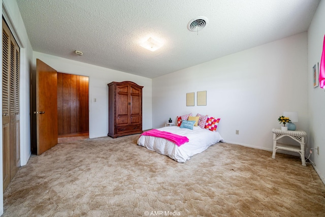 1201 New Hope Rd, Stamford, TX 79553 - bedroom with carpet flooring, a closet, and a textured ceiling