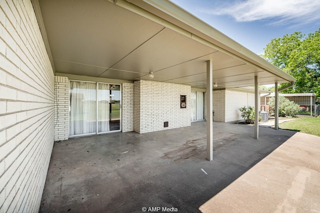 1201 New Hope Rd, Stamford, TX 79553 - view of patio / terrace with an attached carport and central AC unit