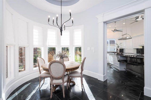 12229 Pecan Forest Dr, Dallas, TX 75230 - dining room featuring a high ceiling, baseboards, ceiling fan, and a chandelier