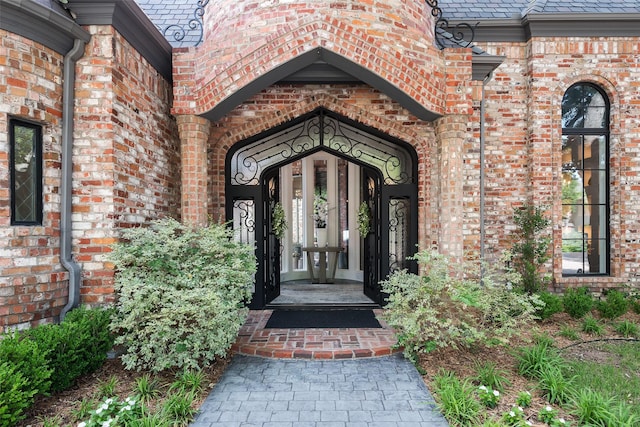 12229 Pecan Forest Dr, Dallas, TX 75230 - property entrance featuring brick siding and a high end roof