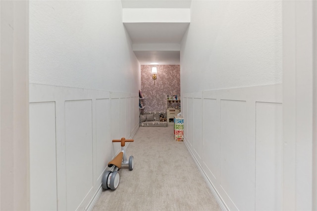109 Sceptre Dr, Rockwall, TX 75032 - hall with a decorative wall, wainscoting, and carpet flooring