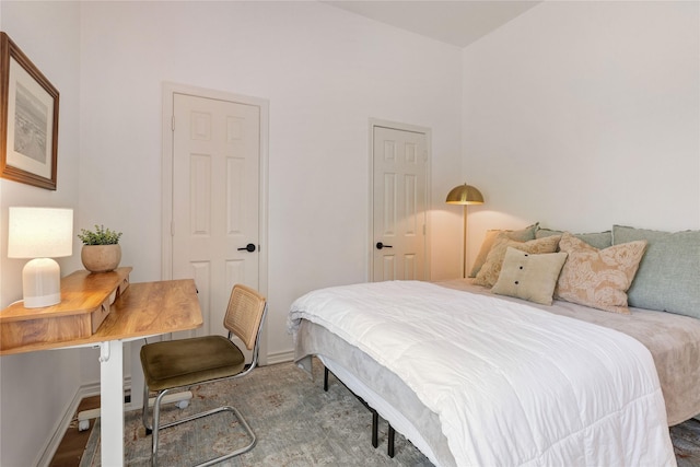 carpeted bedroom with baseboards