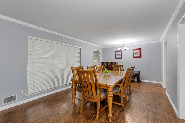 1317 Kingsbridge Dr, Garland, TX 75040 - dining space featuring a chandelier, ornamental molding, dark wood-style flooring, and baseboards