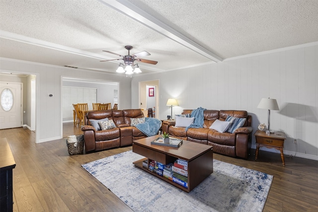 1317 Kingsbridge Dr, Garland, TX 75040 - living area featuring a textured ceiling, ceiling fan, and wood finished floors