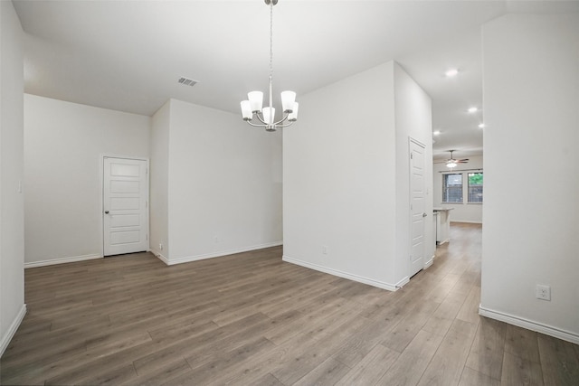 505 Pleasant Hill Ln, Fate, TX 75189 - unfurnished dining area featuring a chandelier, wood finished floors, baseboards, recessed lighting, and a ceiling fan