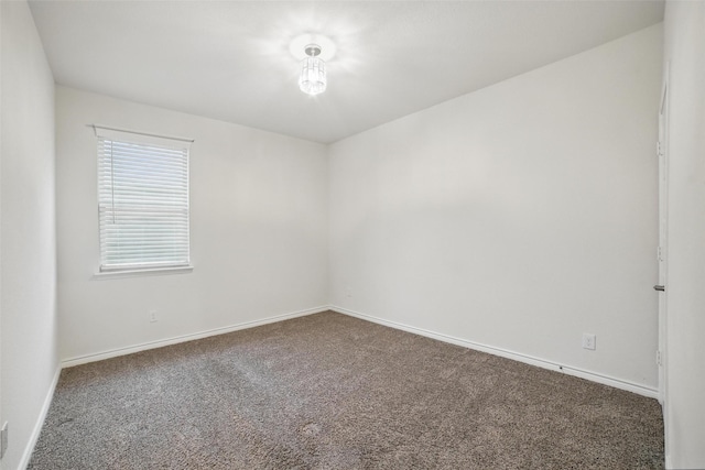505 Pleasant Hill Ln, Fate, TX 75189 - spare room with carpet and baseboards