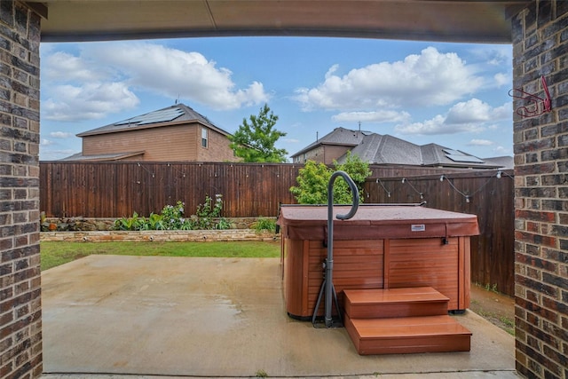 505 Pleasant Hill Ln, Fate, TX 75189 - view of patio / terrace with a hot tub and a fenced backyard
