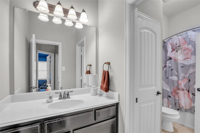 8205 Saint Clair Dr, Mckinney, TX 75071 - full bathroom featuring vanity, toilet, and shower / bathtub combination with curtain