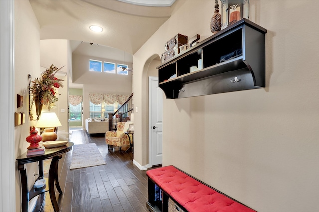 8205 Saint Clair Dr, Mckinney, TX 75071 - mudroom with arched walkways, dark wood-style floors, baseboards, a high ceiling, and recessed lighting