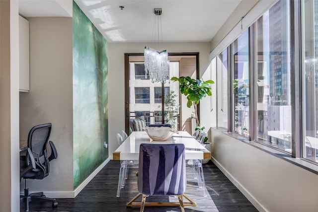 1200 Main St Unit 809, Dallas, TX 75202 - dining area featuring baseboards, healthy amount of natural light, and a chandelier