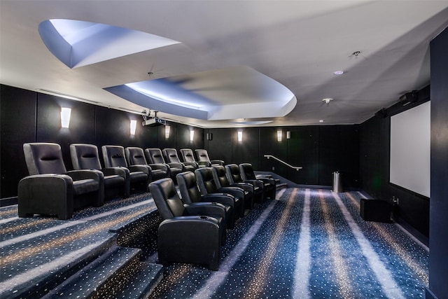 1200 Main St Unit 809, Dallas, TX 75202 - home theater featuring carpet floors, a raised ceiling, and a decorative wall