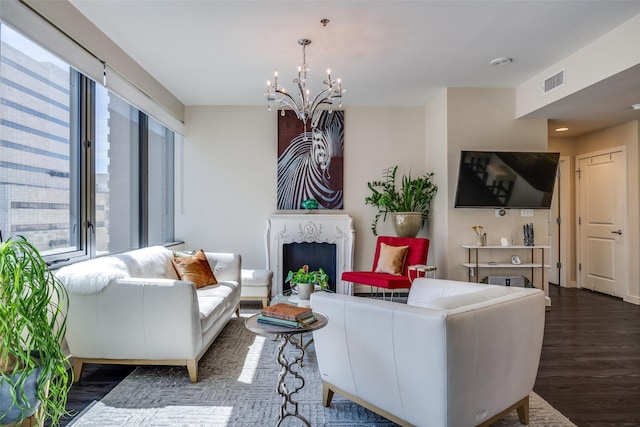 1200 Main St Unit 809, Dallas, TX 75202 - living room featuring a chandelier, wood finished floors, and a fireplace
