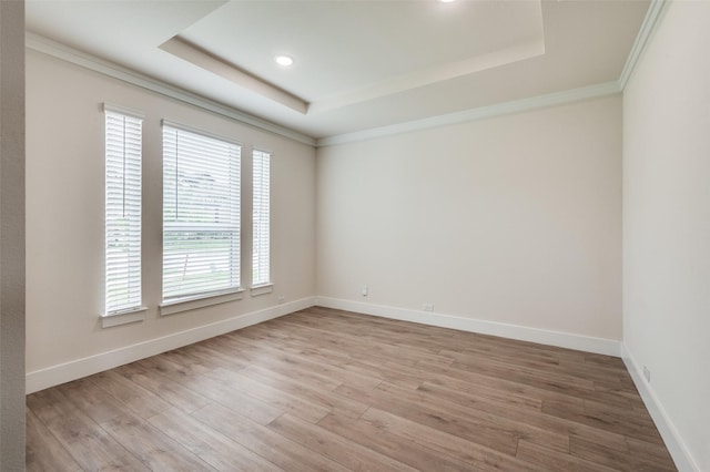 6725 Palmdale Dr, Fort Worth, TX 76123 - unfurnished room featuring a raised ceiling, light wood-style floors, baseboards, ornamental molding, and recessed lighting
