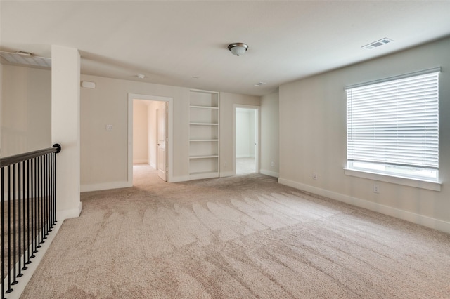 6725 Palmdale Dr, Fort Worth, TX 76123 - empty room with built in features, baseboards, and carpet