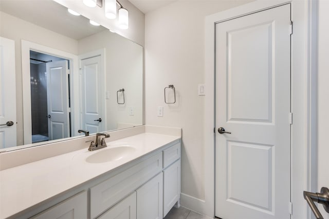 6725 Palmdale Dr, Fort Worth, TX 76123 - bathroom with vanity, baseboards, and tile patterned floors