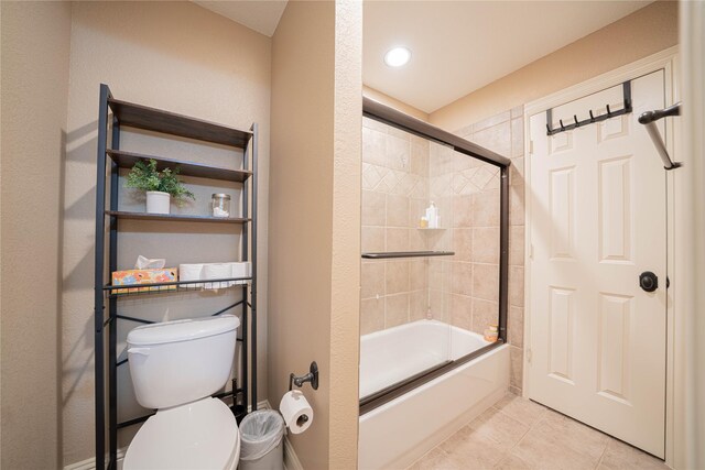 1020 High Meadow Dr, Mount Vernon, TX 75457 - bathroom with toilet, tile patterned flooring, and shower / bath combination with glass door