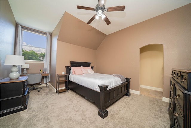 1020 High Meadow Dr, Mount Vernon, TX 75457 - bedroom with light carpet, ceiling fan, baseboards, lofted ceiling, and arched walkways