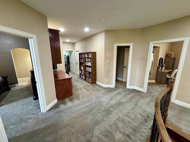1020 High Meadow Dr, Mount Vernon, TX 75457 - carpeted living area featuring baseboards, arched walkways, and recessed lighting