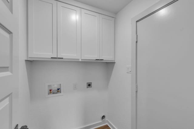 15630 Brittain Ct, Lindale, TX 75771 - laundry room with cabinet space, hookup for an electric dryer, hookup for a washing machine, and baseboards
