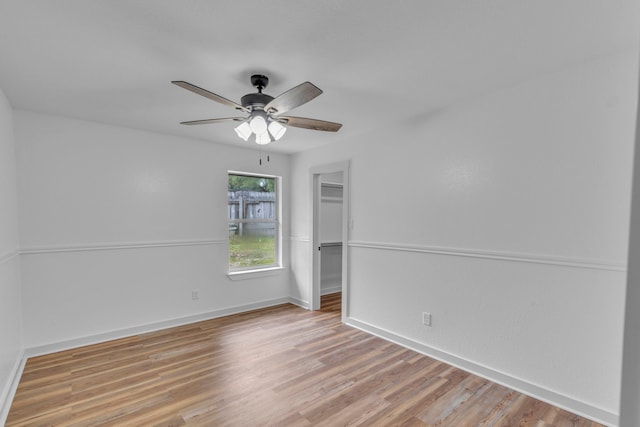 15630 Brittain Ct, Lindale, TX 75771 - spare room with a ceiling fan, light wood-style flooring, and baseboards