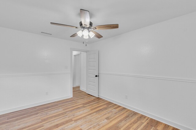 15630 Brittain Ct, Lindale, TX 75771 - empty room with ceiling fan, baseboards, and light wood-style floors