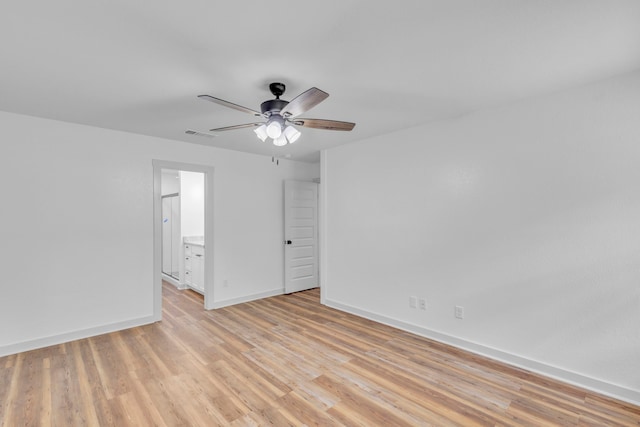 15630 Brittain Ct, Lindale, TX 75771 - spare room featuring a ceiling fan, baseboards, and light wood-style flooring