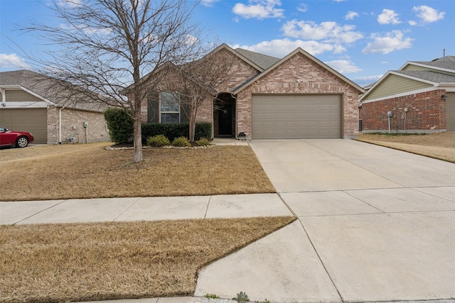 8332 Trickham Bnd, Fort Worth, TX 76131 - view of front of property with an attached garage, brick siding, driveway, and a front lawn