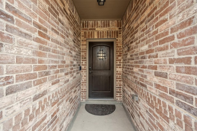 8332 Trickham Bnd, Fort Worth, TX 76131 - view of exterior entry featuring brick siding