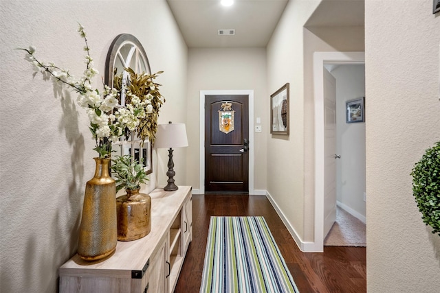 8332 Trickham Bnd, Fort Worth, TX 76131 - doorway featuring dark wood-style flooring and baseboards