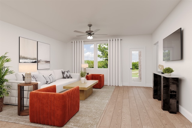 3929 Lupine Trl, Midlothian, TX 76084 - living room featuring light wood-style flooring, a ceiling fan, and baseboards