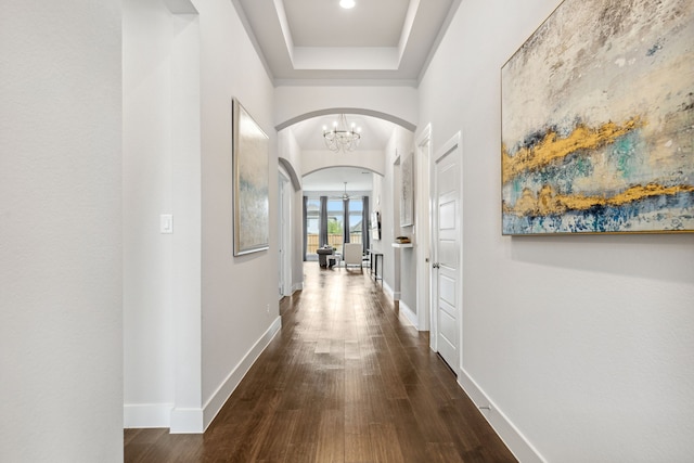 1108 Sandgate Dr, Forney, TX 75126 - hall featuring arched walkways, a chandelier, dark wood-style floors, baseboards, and recessed lighting