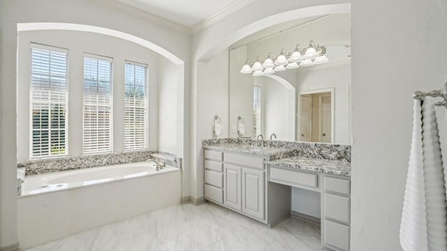 2026 Spindletop Trl, Frisco, TX 75033 - full bath with plenty of natural light, marble finish flooring, a garden tub, crown molding, and vanity